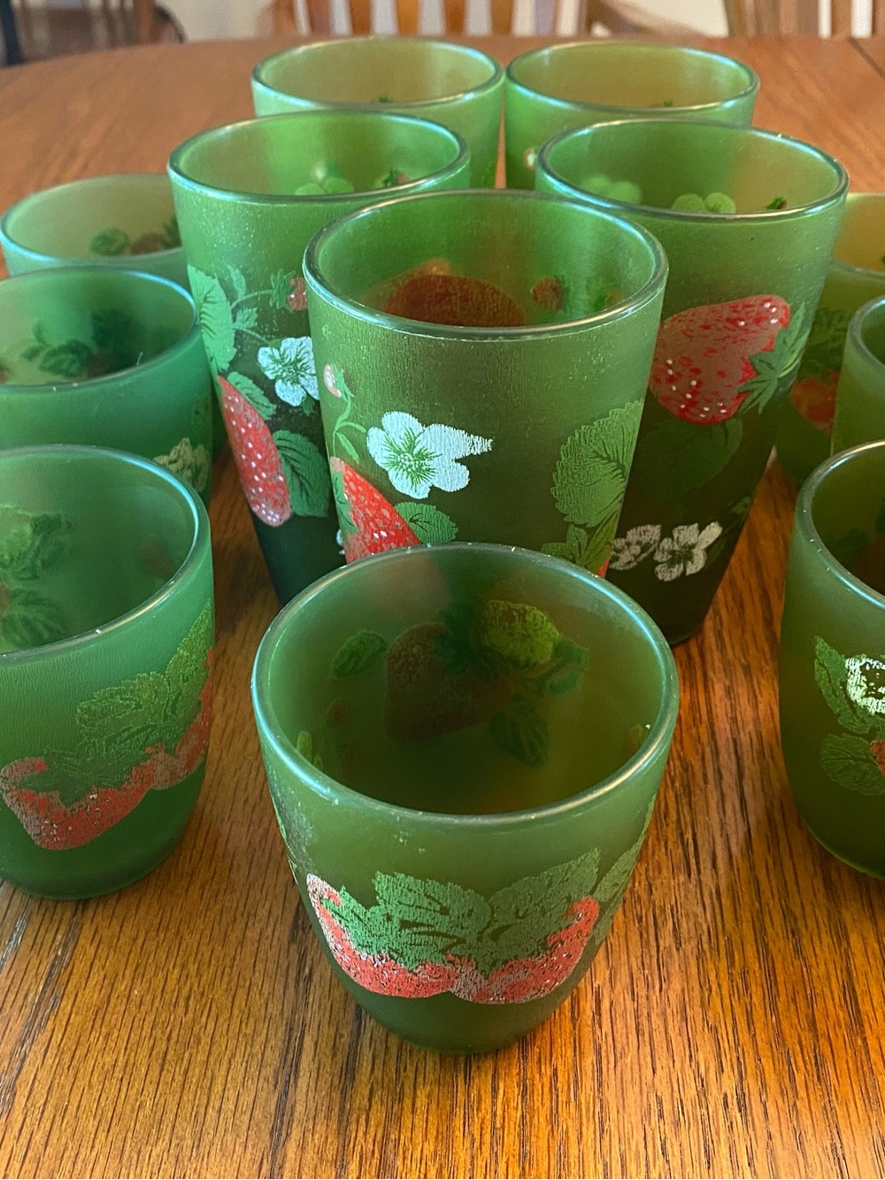 Green tumblers with strawberry design